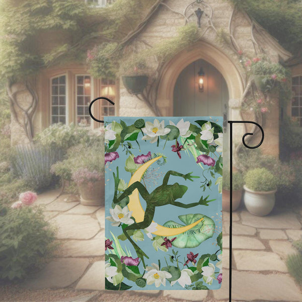 a garden flag with a frog on it