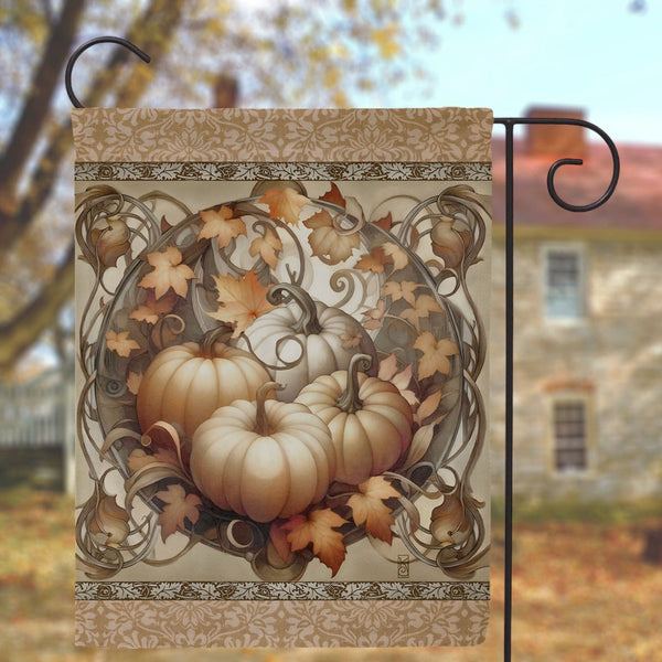 a flag with a picture of pumpkins and leaves on it