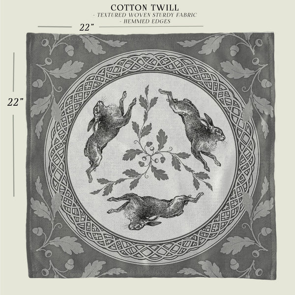 a black and white photo of a plate with rabbits on it