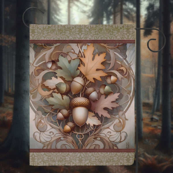 a picture of a leaf and acorn design