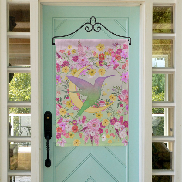 a blue door with a bird and flowers on it
