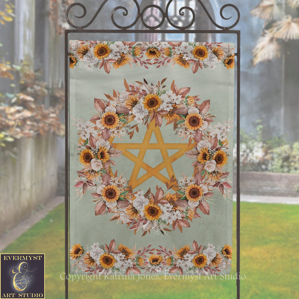 a banner with a floral design and a star in the center, displayed outdoors on a metal stand.
