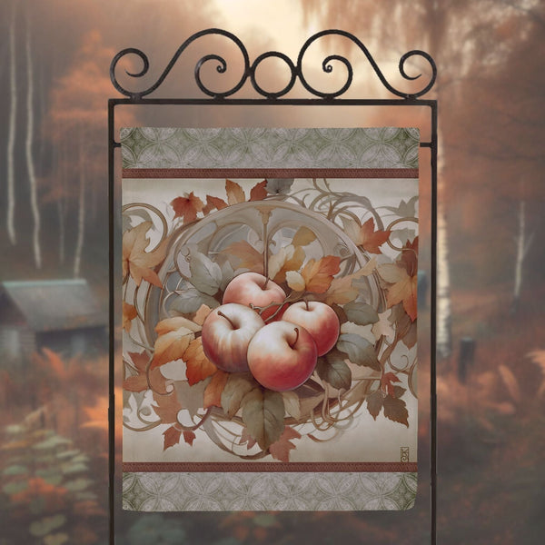 a picture of apples hanging on a metal frame