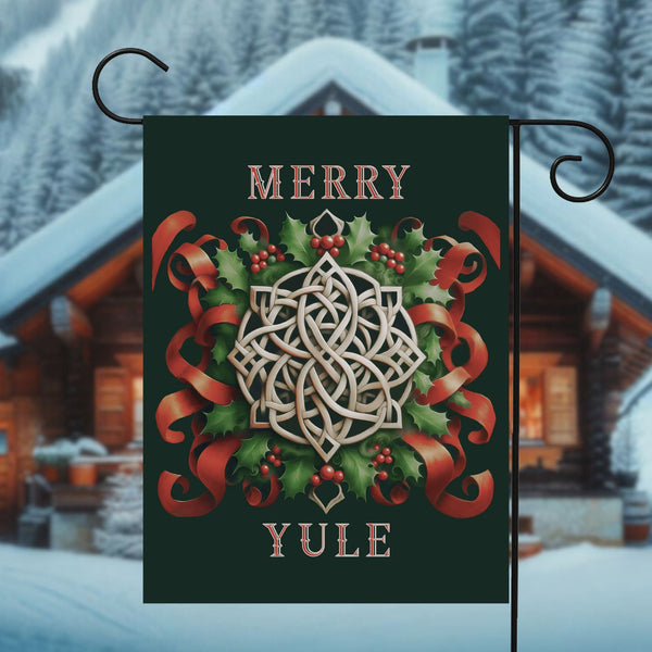 a merry yule banner hanging from a pole