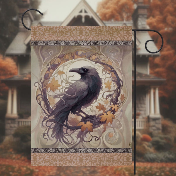 a black bird sitting on top of a metal pole