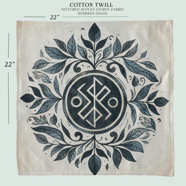 a black and white picture of a cloth with a design on it