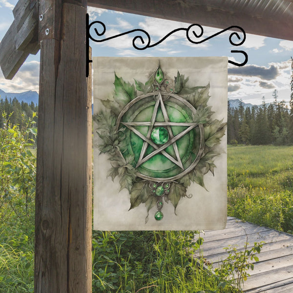 a picture of a green pentagramil hanging from a wooden fence