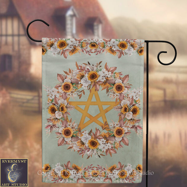 A banner with a floral design and a golden star in the center, hanging on a black metal hook.