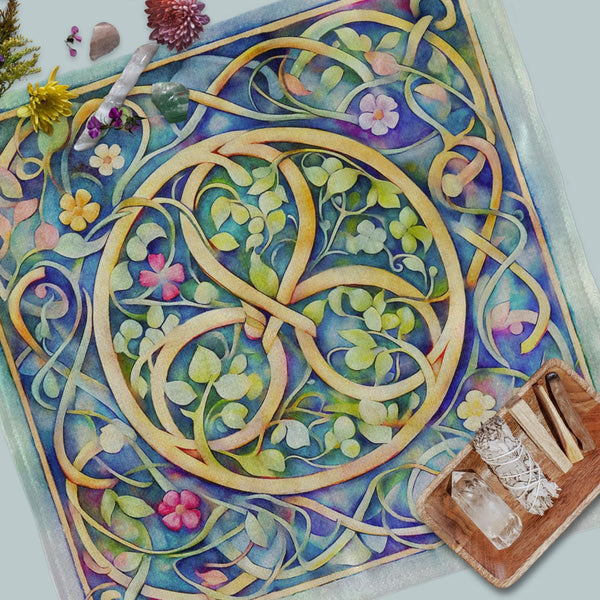 a painting of a flowered design on a blue background